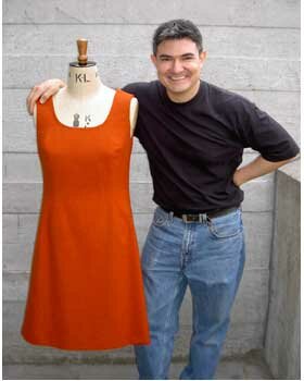 Paul Hawley with an example of his dressmaking work